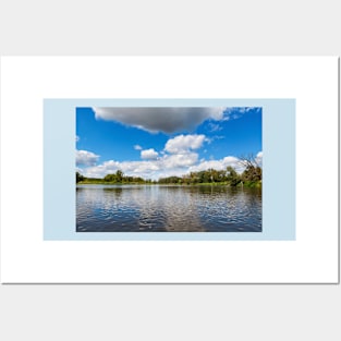 Blue cloudy summer sky over Bug river, Poland, Europe Posters and Art